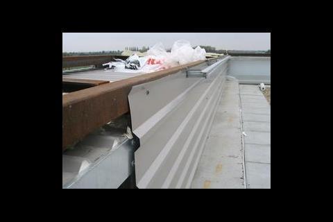Careful attention must be paid at the interfaces between the roof and wall to create an airtight barrier